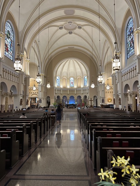 A view of the sanctuary from the back of the church before Mass began. The sanctuary has been built out into the crossing of the church, making good use of the interior space.