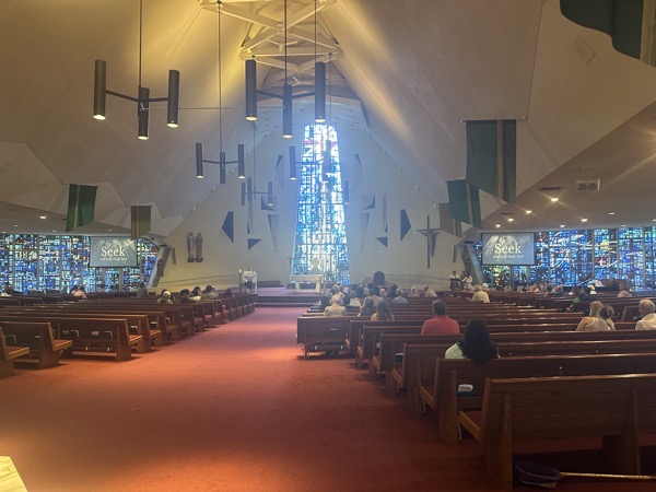 The interior of the church. It’s the post-Vatican II semi-circle design to bring as many people as possible as close as possible to the sanctuary.