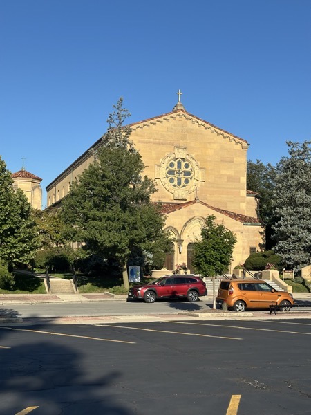 The front of the church, part of a complex which takes most of a city block in the same Spanish colonial style