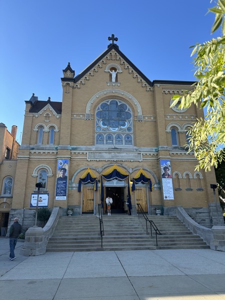 The brick façade of the front of the church