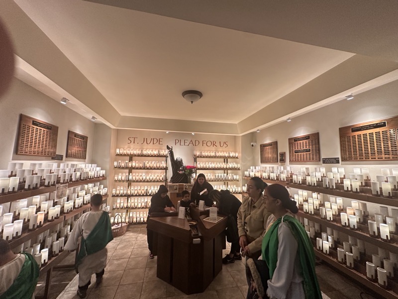 The side alcove with candles lit for various petitioners’ intentions
