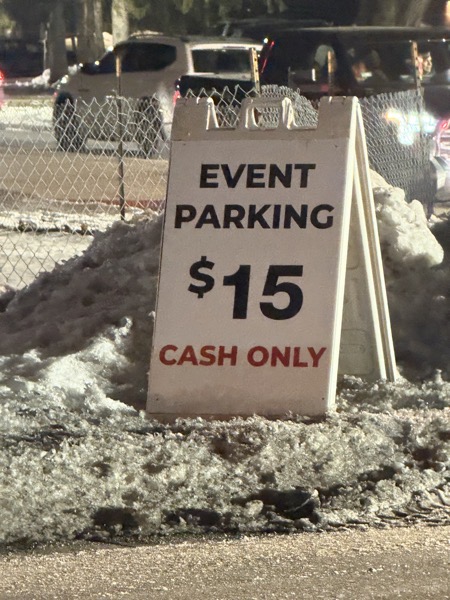 Image of a sign reading, “Event Parking $15 Cash Only”