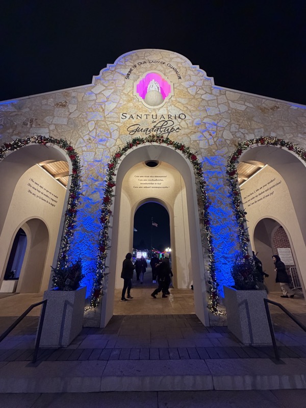 IMG_1096.jpeg The entrance to the shrine, a set of arches in Spanish colonial style leading to an outdoor plaza where the shrine itself is. Inside the arched vestibule are inscriptions in Spanish, Nahautl and English