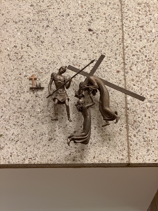 IMG_1631.jpeg One of the stations of the cross, this one showing Veronica wiping Jesus’s face. The stations have small figures maybe 9–12 inches tall representing those present at each station sculpted in full 3-D and mounted on the wall. The overall effect is quite nice.